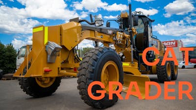 What are the features of a Caterpillar grader?