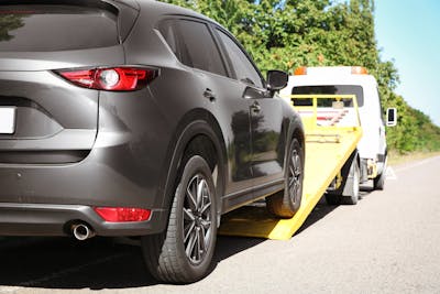 Tow Truck Cost Guide 2022: How much does towing cost?